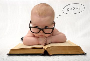 Baby on a book