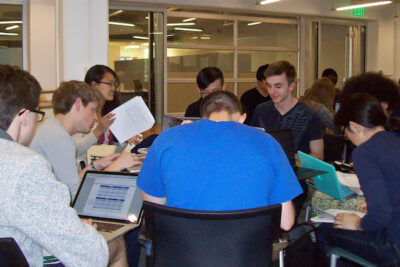 students working around a table