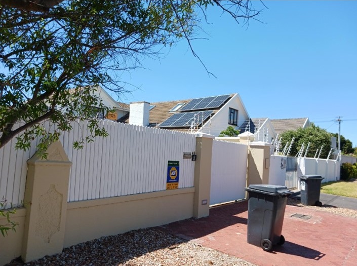 home with solar panels on roof